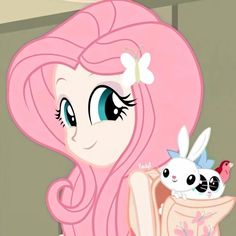 the pinkie is holding a small stuffed animal