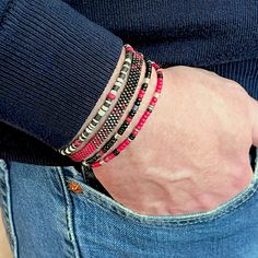 Rugged Red Bracelets for Valentine's Day or Any Day Ombre Band: Flat woven; just under 1/4"w; glass beads; sterling silver clasp & 1" extender chain. Bracelet Strand A: Stretch style; vinyl heishi beads; red glass seed beads. Bracelet Strands B & C: Stretch style; glass seed beads. Perfect solo or stacked. Red Bohemian Stackable Bracelets, Red Stackable Bracelets With Round Beads, Red Adjustable Stackable Beaded Bracelets, Red Adjustable Stackable Bracelets, Adjustable Red Stackable Beaded Bracelets, Adjustable Red Stackable Bracelets, Adjustable Stackable Red Beaded Bracelets, Adjustable Red Stackable Stretch Bracelet, Adjustable Hand-strung Red Wristband