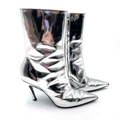 Balenciaga Slash 80 Metallic Silver Boots Mirror Leather Heeled Pointed Toe Sz 36 / 6 Us Good Overall Preowned Condition. Boots Have Standard Signs Of Wear, Such As Scuffs On Toes, On Back And Leather Creasing. Soles Don't Indicate Much Wear. Silver Zip Detail Ankle Boots With Pointed Toe, Side Zip Fastening And A Stiletto Heel. Box & Dust Bag Are Not Included. Shoes Balenciaga, Silver Boots, Balenciaga Shoes, Stiletto Heel, Leather Heels, Side Zip, Stiletto Heels, Bootie Boots, Metallic Silver