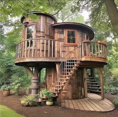 a tree house built into the side of a hill