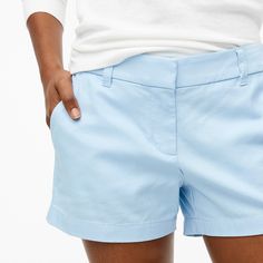 Fitted Jean Shorts In Solid Color, Classic Summer Skort, Classic High-waisted Bermuda Shorts With Relaxed Fit, Classic High-waisted Bermuda Shorts, Fitted Cotton Bermuda Shorts For Spring, Spring Cotton Shorts With 5-inch Inseam, Spring Bermuda Shorts With Rolled Hem And Relaxed Fit, Classic High-waisted Shorts For Spring, Classic Solid Bermuda Shorts