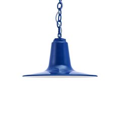 a blue light hanging from a chain on a white wall