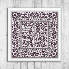 a blue and white framed artwork print on wooden planks, featuring an ornate design