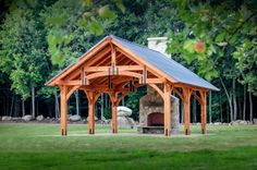 an outdoor pavilion in the middle of a park