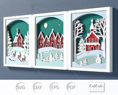 three paper cut christmas scenes hanging on the wall