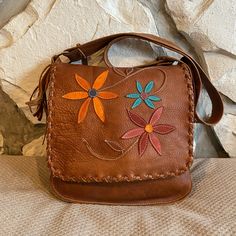 Gorgeous Handmade (Black Crow Brand) Leather Messenger Style Bag, Soft Supple Leather With Flower Designs On The Flap, Open Flap Style With Snap Closure Inside, Nice Thick Strap For Comfort And Easy Carrying, Lots Of Fringe And A Few Scratches Here And There From Use Bag Measures 12” L X 3” W X 12” H Strap Has 23” Drop (Can Be Worn As Crossbody) Smoke Free Home Boho Gypsy Southwestern Home Boho, Black Crow, Leather Messenger, Vintage Bags, Handmade Leather, Saddle Bags, Leather Handmade, Snap Closure, Flower Designs