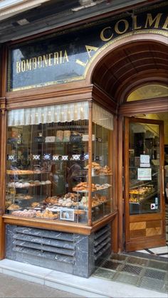 a bakery with lots of donuts in front of it