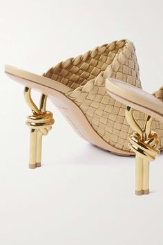 Luxury Woven Leather Mules, Chic Woven Leather Mules With Open Heel, Luxury Intrecciato Weave Heels For Formal Occasions, Chic Formal Mules With Woven Leather, Chic Formal Woven Leather Mules, Elegant Woven Leather Open Toe Mules, Luxury Intrecciato Weave High Heels, Luxury Beige Evening Mules, Luxury Beige Mules For Evening