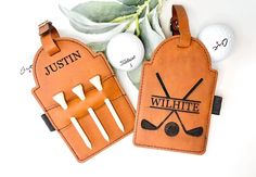 two luggage tags with golf clubs on them