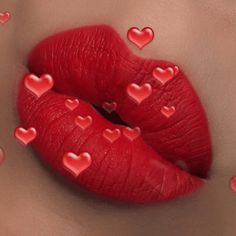 a woman's lips with red hearts on the lip and in the middle of them