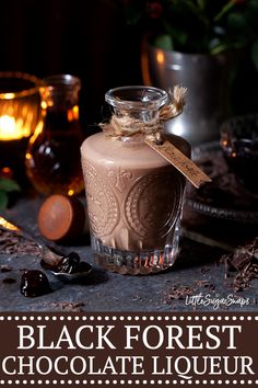 a jar filled with chocolate sitting on top of a table