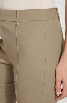 A cropped length and an elastic waist further the casually cool attitude of these pull-on pants that are right for work and play. 25" inseam; 8 1/2" leg opening; 10 1/2" front rise; 14 1/2" back rise Pull-on style 52% cotton, 42% viscose, 6% elastane Machine wash, line dry Imported Casual Straight Leg Pull-on Dress Pants, Workwear Bottoms With Pull-on Style And Cropped Leg, Fitted Cropped Leg Pants With Elastic Waistband, Fitted Cropped Pants With Elastic Waistband, Fitted Pants With Elastic Waistband And Cropped Leg, Workwear Cropped Leg Pull-on Pants, Versatile Pull-on Pants For Business Casual, Pull-on Cropped Pants For Work, Cropped Leg Pull-on Pants For Work