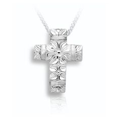 a silver cross with flowers on it is shown in the middle of a white background