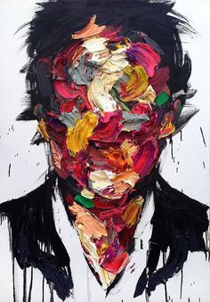 a painting of a man's face covered in paint