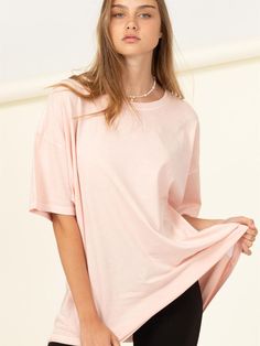 Have a more leisurely day in this Just Chilling Oversized T-Shirt. A casual tee that shapes a crew neckline with drop shoulders and short sleeves over a wide-cut bodice that extends into an oversized silhouette with a simple hem. Choose your favorite color and pair it with cute shorts and or your favorite denim or knot it over a midi skirt. Colors: Whipped Cream, Black, Jam, Brown Sugar, Hunter Green, Blush, or Dusty Blue Fabric: 100% Cotton Includes: x1 Shirt Sizes: S/M or M/L Oversized Short Sleeve T-shirt For Everyday, Basic Oversized Crew Neck T-shirt, Trendy Batwing Sleeve T-shirt For Summer, Oversized Cropped Crew Neck T-shirt For Everyday, Trendy Oversized Cropped T-shirt For Summer, Spring Graphic Tee With Drop Shoulder, Oversized Solid Color Graphic Tee, Oversized Trendy Cropped T-shirt With Short Sleeves, Oversized Solid Crew Neck T-shirt