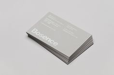 business cards stacked on top of each other with the word boscence printed on them