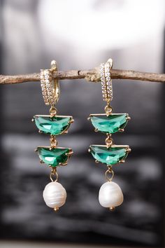 Incredibly stylish emerald green earrings with real freshwater pearls in the art deco style for your celebration, be it a wedding, anniversary, just a gift to your loved one :) Retro jewelry from the 1920s This is a very beautiful handmade gift made with love in France for each of you :) Pay attention!! Since the pearls are real, they do not have the same diameter and shape, which makes the earrings even more unique for you :) Follow the link below to see more jewelry for your special day. https Green Dangle Hoop Earrings For Anniversary, Elegant Green Crystal Earrings For Pierced Ears, Elegant Green Pearl Earrings For Pierced Ears, Green Drop Pearl Earrings For Wedding, Green Dangle Chandelier Earrings For Anniversary, Elegant Emerald Hoop Earrings For Anniversary, Elegant Emerald Drop Earrings, Green Crystal Earrings For Pierced Ears, Green Chandelier Earrings For Anniversary