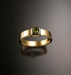 "4mm square Peridot is bezel-set in 14k Yellow Gold. 4mm wide by 1.5mm thick smooth comfortable band. Specify your ring size in a \"note to seller\" at check-out" Mens Gemstone Rings Unique, Peridot Ring Gold, Stone Ring Design, Mens Ring Designs, Mens Gemstone Rings, Green Tourmaline Ring, Single Stone Ring, Light Jewelry, Future Engagement Rings