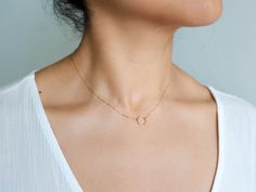 "Our dainty Karma Circle Necklace is the perfect necklace for minimalists. You can pick from a small or big circle to fit your style! Perfect for daily wear. Makes a great gift for your loved ones, and even yourself. Simple, dainty, and minimal necklace. . . . . . . . . . . . . . . . . . . . . . . . . . . . . . . . . . . . . . . . . . . DETAILS + Necklace lengths: 14\" with 2\" extender + 10mm charm + 14k gold filled -or- sterling silver chain, spring clasp, and findings LAYERED NECKLACE DETANGL Tiny Minimalist Charm Necklace, Minimalist Tiny Round Charm Necklace, Tiny Round Minimalist Charm Necklace, Minimalist Tiny Round Necklace, Tiny Round Minimalist Necklace, Minimalist Round Charm Necklace For Bridesmaid, Dainty Round Charm Necklace For Bridesmaids, Minimalist Open Circle Charm Necklace As Gift, Open Circle Necklace