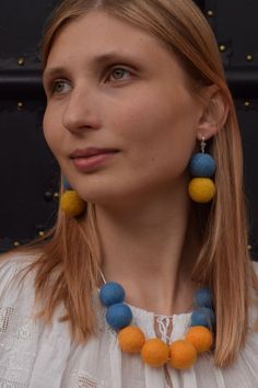 Elevate your style with this stunning handmade jewelry set from Ukraine 🇺🇦! Made with yellow and blue beads from felted wool balls, this set includes a necklace and earrings. Perfect for adding a touch of love and uniqueness to your look 💛💙 #HandmadeJewelry #UkrainianCraftsmanship #UniqueDesign #JewelrySet #FashionStatement  #eBay #eBayStore #eBaySeller #Ukraine #Yellow #JewelrySet #Reversible #Love #Natural #Necklace #NickelFree #Women #yellowblue #Unit #Earrings #FlagsPolitical #wool Felted Wool Balls, Felt Wool Ball, Handmade Jewelry Set, Felted Earrings, Natural Necklace, Felt Necklace, Ukrainian Flag, Made In Ukraine, Wool Balls