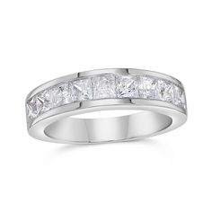 a white gold ring with princess cut diamonds