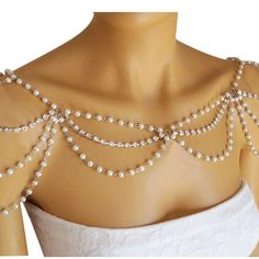 Elegance Draped in Pearls Embrace the timeless charm of our Handcrafted Vintage-Inspired Faux Pearl Shoulder Necklace. Each pearl is meticulously selected to ensure a uniform luster that cascades over your shoulders, creating a silhouette of grace and sophistication. This piece is not just an accessory; it's a testament to classic beauty that transcends trends. Craftsmanship Meets Heritage With an unwavering commitment to quality, this shoulder necklace is hand-strung with precision, integrating Pearl Shoulder Necklace, Pearl Shawl, Shoulder Chain Jewelry, Wedding Bolero, Shoulder Jewelry, Shoulder Necklace, Wedding Cape, Bridal Wrap, Jewelry Luxury