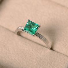 This ring features a 6*6mm princess cut lab emerald and sterling silver finished with rhodium. Customization is available. It is made by hand, and it will take about 7 days to finish the ring after your payment is completed. Main stone: lab emerald Main stone weight: Approx 1.10 ct Metal type: sterling silver finished with rhodium Accent stone: cz Customization is available, I also can make it with 14k solid gold (white or yellow or rose) and diamond accent stone, just feel free to contact me. I Dream Engagement, Dream Engagement Rings, Emerald Engagement, Emerald Engagement Ring, Ring Ring, Princess Cut, Sterling Ring, Or Rose, Types Of Metal