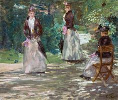 two women in long dresses are sitting on a bench and one woman is standing next to her