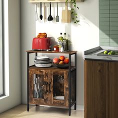 a kitchen with wooden cabinets and hanging utensils