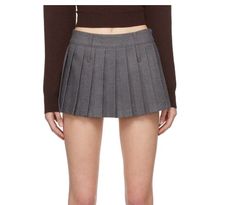 Pleated Fitted Tennis Skirt For Fall, Pleated Stretch Mini Skirt For Fall, Fall Pleated Stretch Mini Skirt, Fitted Tennis Skirt With Accordion Pleats For Fall, Fitted Accordion Pleats Skirt For Fall, Fitted Pleated Mini Skirt For Fall, Fitted Short Pleated Skirt For Fall, Fall Fitted Mini Skirt With Pleated Waist, Fitted Gray Mini Skirt