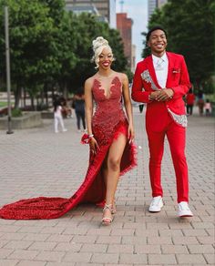 Red And Black Prom Ideas, Red And White Prom Couples, Red Couple Outfits, Prom Color Ideas For Couples, Red Prom Ideas, Black And Red Prom Couple, Red Prom Dress Couple, Red Prom Dress Black Women, Dramatic Prom Dresses