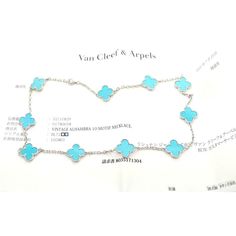 Van Cleef & Arpels 18k White Gold 10 Motif Alhambra Turquoise Necklace Paper  This is an extremely rare, highly collectible turquoise Alhambra necklace by Van Cleef & Arpels*** This necklace comes with service paper from a VCA store and a VCA box.   Metal: 18k white gold  Length: 17" Width:  15mm  Weight: 22 grams  Stones: 10 motifs of Turquoise Alhambra shape stones 15mm each  Hallmarks: VCA 750 BL72405(serial number omitted) T3184orddd  Please reference the dimensions in the description for the best approximate dimensions. Exquisite Turquoise Jewelry Gift, Exquisite Turquoise Jewelry As Gift, Exquisite Turquoise Jewelry For Gift, Luxury Round Turquoise Necklace, Luxury Turquoise Round Necklace, Luxury Turquoise Gemstone Necklace, Luxury Turquoise Pendant Necklace, Luxury Blue Hallmarked Necklace, Luxury Sterling Silver Turquoise Necklace