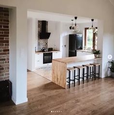 the kitchen is clean and ready to be used as a dining room or living room