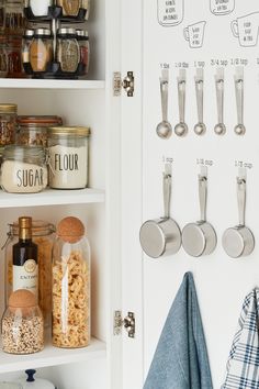 the kitchen is organized and ready to be used as a storage area for cooking utensils