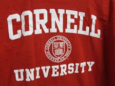 "Cornel University T Shirt This is the coolest of the Cool! 1990's Excellent condition Labels are gone LARGE Shoulder 23\" Shirt Length 28\" Chest 48\" Sleeve Length 5\" from underarm Ha! https://www.etsy.com/shop/BelindasStyleShop" University Tshirt, Grass Valley, Cornell University, College T Shirts, Ivy League, The Cool, The North Face Logo, Retail Logos, Ivy