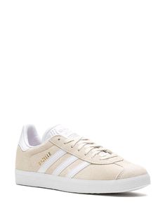 Adidas Gazelle "Off White" Sneakers - Farfetch Classic Adidas Suede Sneakers, Cream Suede Sneakers For Streetwear, Classic Adidas Lace-up Sneakers, Classic Cream Suede Sneakers, Cream Adidas Lace-up Sneakers, Sporty Adidas Cream Sneakers, Cream Low-top Sneakers With Vulcanized Sole, Cream Lace-up Adidas Sneakers, Adidas Cream Sneakers With Laces