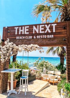 the next beach club and rest - to - bar is located at the entrance to the resort