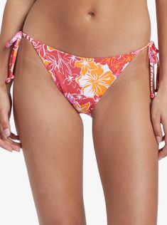 Made of recycled nylon, the Sea Spray Tiki side tie bikini bottoms channel retro island vibes in a Hawaiian floral print. Part of the Hilo Hibiscus Party Collection, this mid-rise swim bottom pairs perfectly with the matching top. Features Eco-Conscious Fabric: Soft, resistant, stretch and recycled nylon fabric Coverage: Bikini coverage Rise: Mid rise Closure: Tie side closure Product appearance may differ slightly depending on print placement Composition 87% Recycled Nylon, 13% Elastane Vacay Vibes, Roxy Girls, Sea Spray, Sport Bh, Swimsuit Cover Ups, Matching Top, Monokini, Shirts & Tops, Women Swimsuits