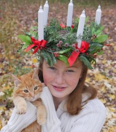 Celebrate Saint Lucia day on December 13th with this beautifully handcrafted wreath. Made with an assortment of realistic winter greens, frosted berries, and plastic candles with metal candle holders. This hair accessory can be reused for a table top decoration. Be sure to include your child's head circumference when ordering for the best fit. The crown is made to fit like a hat would around the head so that it stays in place. Since each wreath is handcrafted, each one is unique and may differ s Saint Lucia Day, Lucia Christmas, Lucy Costume, Santa Lucia Day, Candle Crown, St Lucia Day, Christmas Crown, Realistic Candles, St Lucy