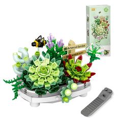 PRICES MAY VARY. 🌿【Ingenious Simulated Plant Bonsai Building Blocks】Create a never-fading bonsai display with this 389 pieces succulent building blocks to enhance your bedroom, office, study, desk decoration. Admire the different shapes, textures and colors that make up the display. 🌿【Inspired by Real Succulents】Mini succulent building pots take inspiration from nature and incorporate various elements (succulents, other algae bees, pebbles and garden signs), delicate and vivid. 🌿【Compact Stru Plant Lego Set, Sakura House, City Street View, Blossom House, Blocks For Toddlers, Succulent Bonsai, Building Blocks Diy, Sakura Tree, Model Building Kits