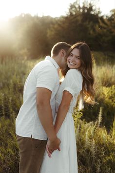 Shy Engagement Photos, Long Grass Couple Photoshoot, Simple Engagement Shoot, Prairie Engagement Photos, Flower Field Couple, Engagement Photoshoot Hairstyles, Engagement Pics In Field, Same Height Couples Poses Photo Ideas, Couple Poses Field