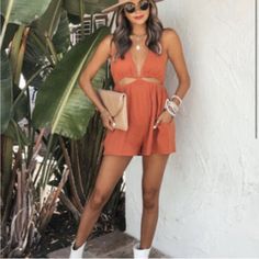 Burnt Orange / Rust Cut Out Romper With Elastic Waistband. Relaxed Fit But True To Size. No Closures, Slip On. Brand New Without Tags. Never Worn, Only Tried On. Casual Cutout Jumpsuits And Rompers For Spring, Casual Spring Jumpsuits And Rompers With Cutout, Summer Casual Jumpsuits And Rompers With Cutout, Casual Summer Jumpsuits And Rompers With Cutout, Summer Cutout Jumpsuits And Rompers For Date Night, Orange Romper, Cell Phone Holster, Phone Holster, Walker Boots