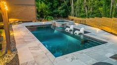 small backyard pools with hot tub - Google Search Small Swimming Pool Ideas, Small Swimming Pool, Rectangular Swimming Pools, Modern Courtyard, Travertine Pool, Pools Backyard Inground, Swimming Pool Ideas