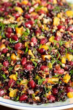 cranberry and orange salad on a white platter