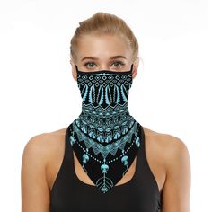 a woman wearing a black bandana with an intricate design on it's face