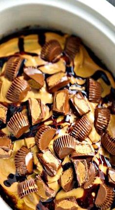 a bowl filled with chocolate chips and peanut butter on top of a red square frame