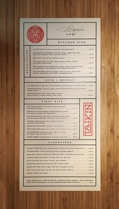 a menu on top of a wooden table