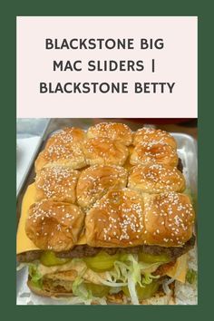 a sandwich with cheese and pickles on it sitting in a tray next to the words blackstone big mac slides i blackstone betty