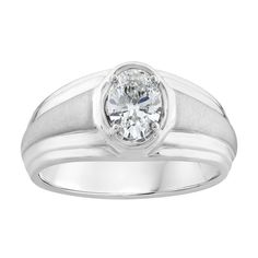 a white gold ring with a round diamond in the center