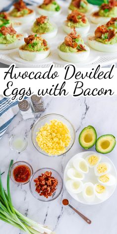 avocado deviled eggs with bacon and other ingredients on a marble counter top